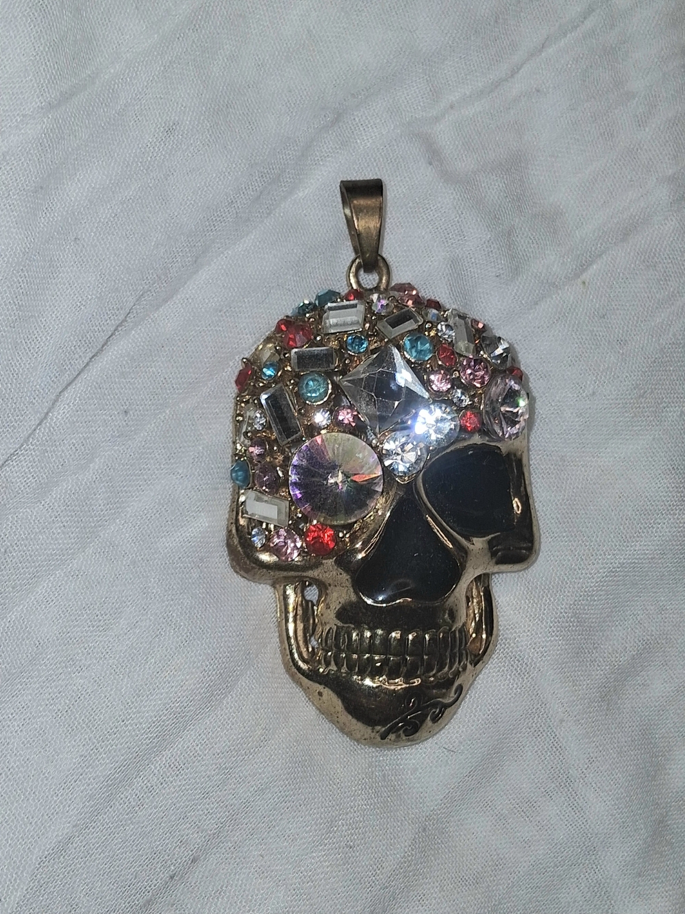 Gold Tone Skull Pendant with Multicolor Crystal Accents